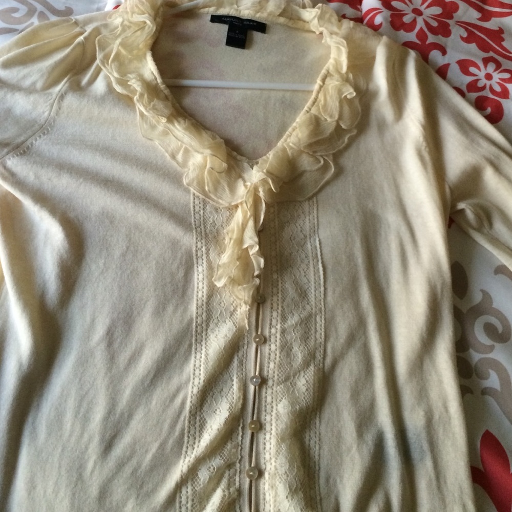 Ivory colored top in size Large
